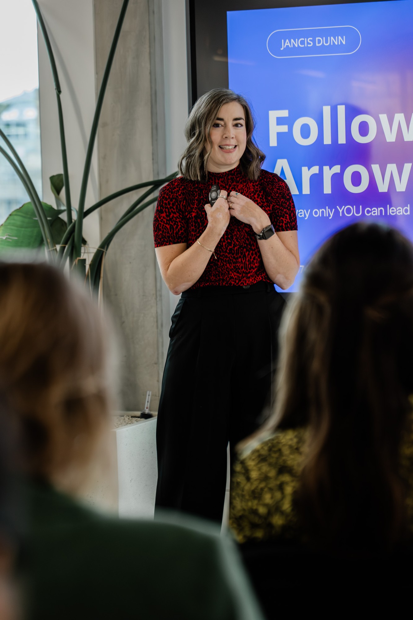 Jancis Dunn smiling while presenting a workshop